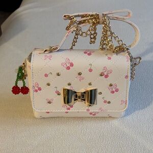 Under One Sky Cherry Print Quilted Crossbody Bag with Gold Bow/crossbodychain